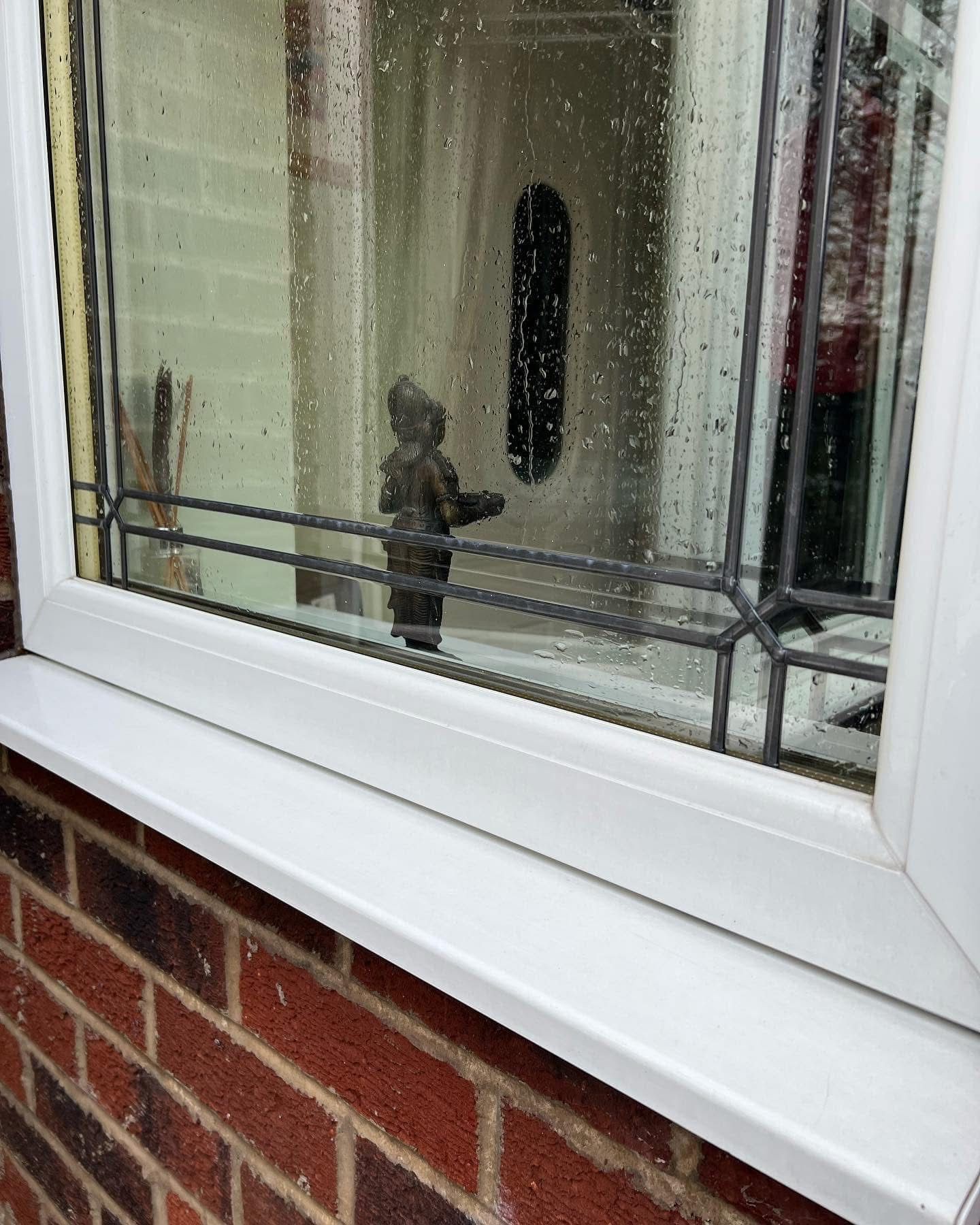Leaded window detail during a clean